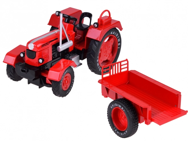 Červený kovový traktor s gumovými kolečky 1:18