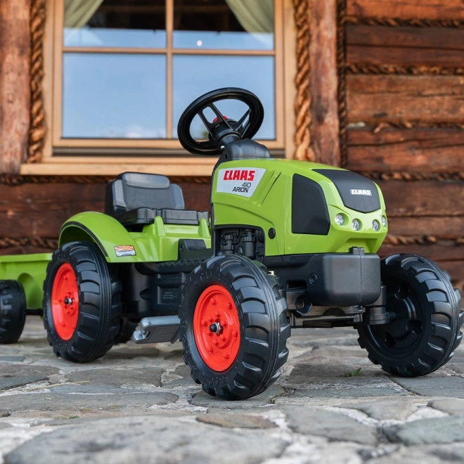 Šlapací traktor Claas Arion 410 s valníkem zelený