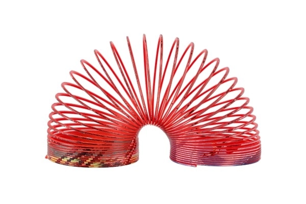 Spirála/pružina dinosaurus plast průměr 6,5cm 4 barvy