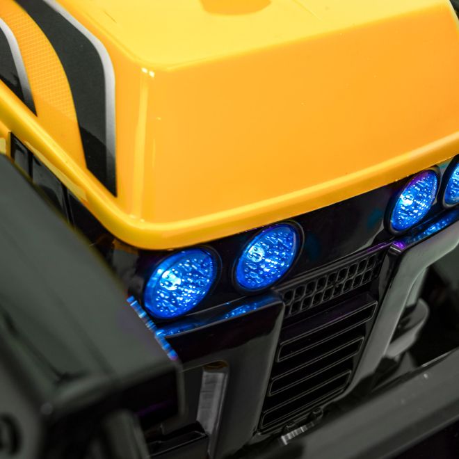 Traktor Buldozer G320 pro nejmenší děti Žlutý + Pohyblivá lžíce + Melodie + Klakson + LED světla