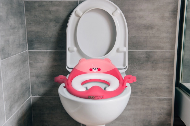 Dětské WC sedátko s madly a měkkým polštářem růžové ECOTOYS