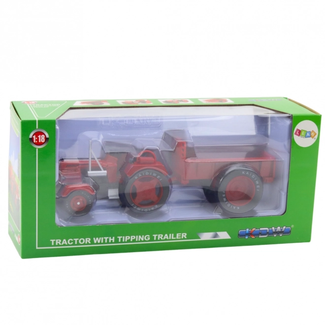 Kovový traktor s přívěsem červený 1:18