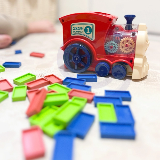 Elektrická lokomotiva s kostkami domino