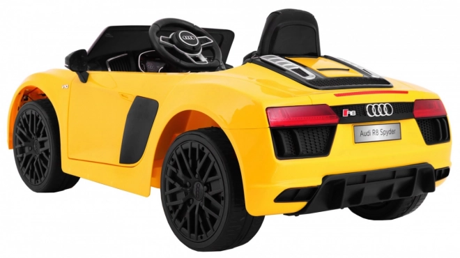 Audi R8 Spyder battery pack Yellow + Dálkové ovládání + EVA + Pomalý start + Rádio MP3 + LED dioda