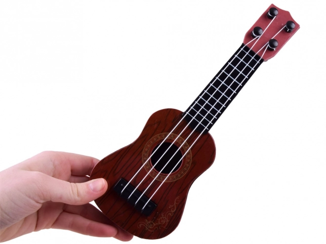 Mini ukulele pro děti 25 cm – tmavě hnědá