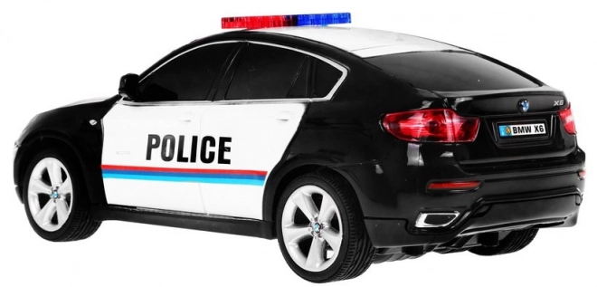 Policejní auto BMW x6 pro děti 8+ Dálkově ovládaná policie 1:24 Světla Rooster