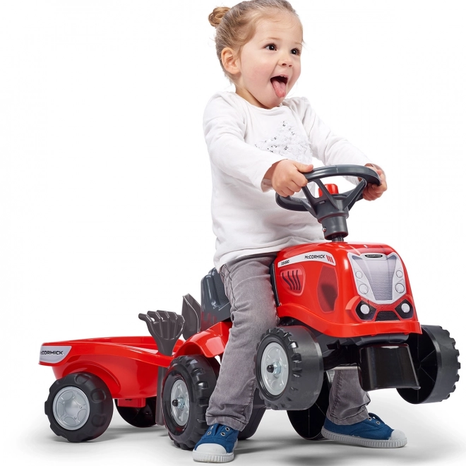 Dětský traktor Baby Mac Cormick červený s přívěsem
