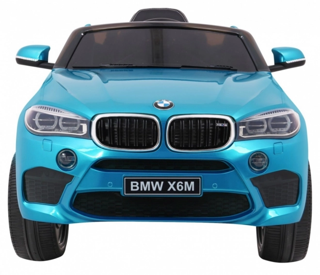 BMW X6M Elektrické dětské auto Modrá barva + dálkové ovládání + EVA + pomalý start + audio + LED dioda