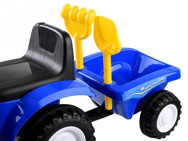 Jeźdżącí traktor s přívěsem New Holland