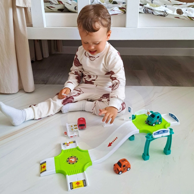 Parkovací garáž s autodráhou a čerpací stanicí Woopie