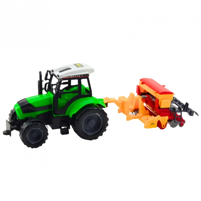 Dětský zemědělský traktor se secím strojem