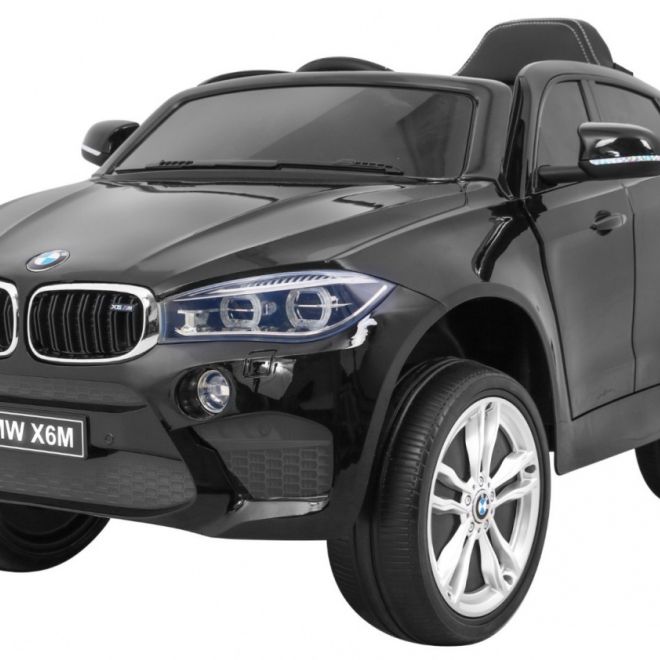 BMW X6M Elektrické dětské auto černé + dálkové ovládání + EVA + pomalý start + audio panel + LED dioda