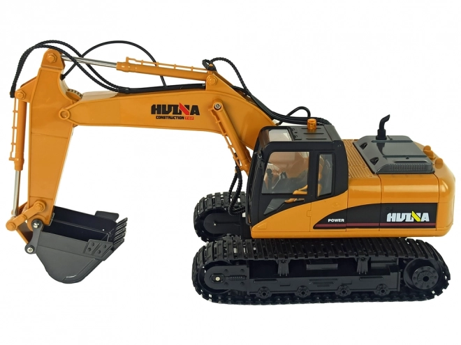 Žlutý RC bagr Caterpillar 1:14 na dálkové ovládání