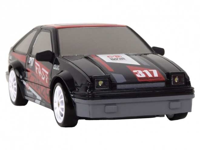 Dálkově ovládané sportovní auto R/C 1:24 černá vyměnitelná kola