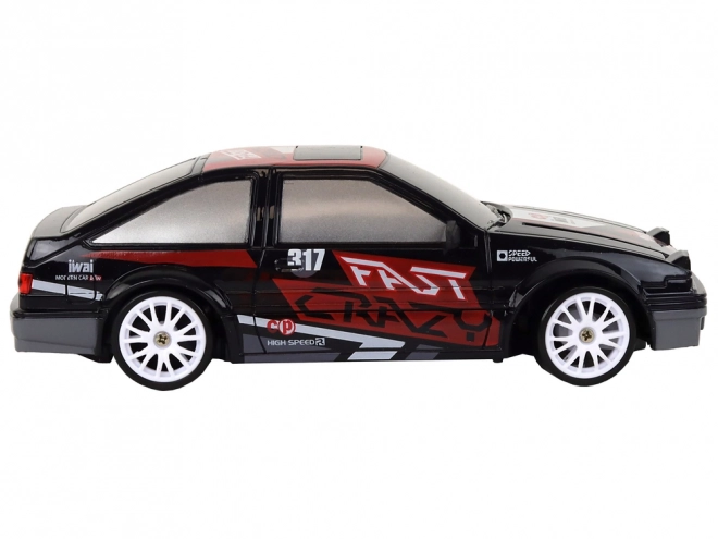 Dálkově ovládané sportovní auto R/C 1:24 černá vyměnitelná kola