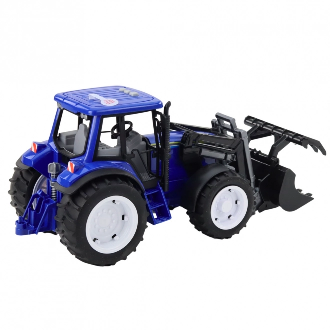 Dětský traktor s pohyblivou lžící modrý