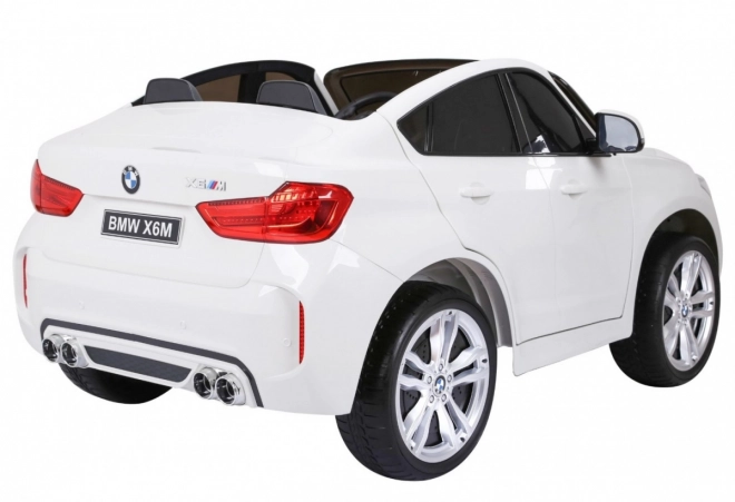 BMW X6M XXL pro 2 děti Bílá + dálkové ovládání + eko kůže + bezpečnostní pásy + pomalý rozjezd + MP3 USB + LED