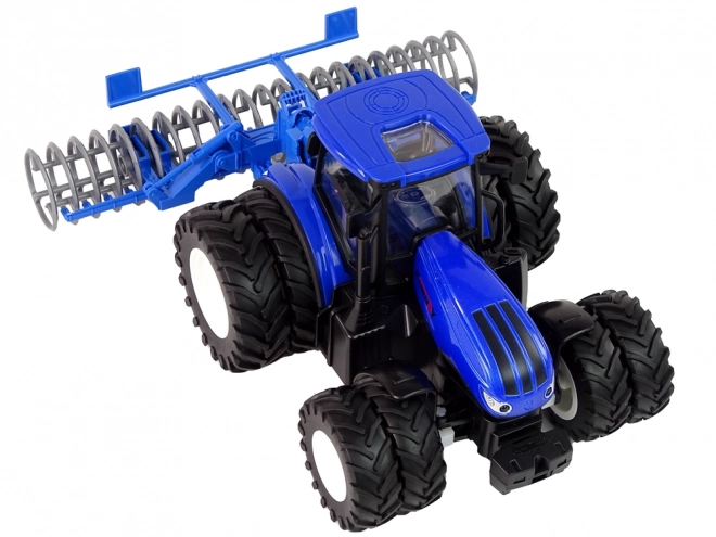 Dálkově ovládaný traktor 1:24 Blue Disc Aggregate Metal