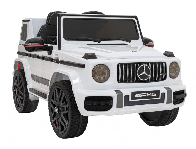 Mercedes AMG G63 pro děti bílý + dálkové ovládání + MP3 LED + pomalý start + EVA + pásy