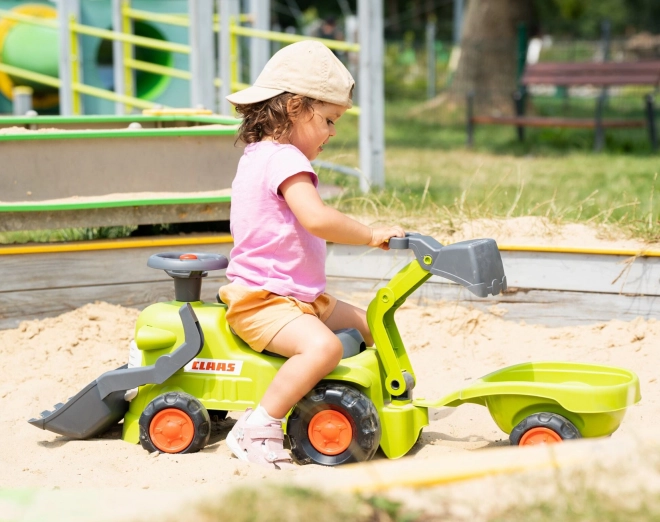 Jezdicí traktor Claas s přívěsem, nakladačem a lžící