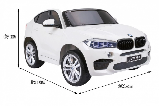 BMW X6M XXL pro 2 děti Bílá + dálkové ovládání + eko kůže + bezpečnostní pásy + pomalý rozjezd + MP3 USB + LED