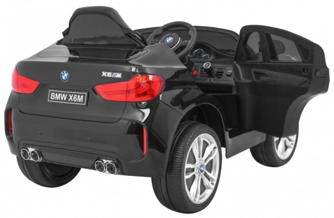 BMW X6M Elektrické dětské auto Lak černá + Dálkové ovládání + EVA + Pomalý start + Audio + LED