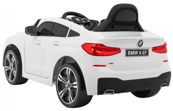 BMW 6 GT Bílé auto na baterie + dálkové ovládání + pomalý start + EVA + pásy + LED MP3