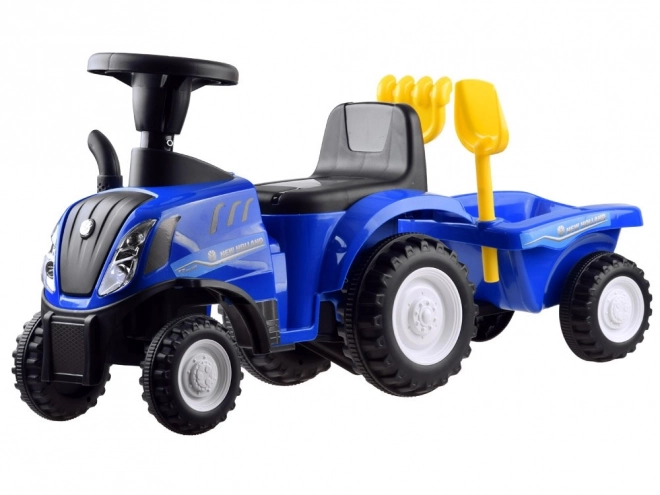 Jeźdżącí traktor s přívěsem New Holland