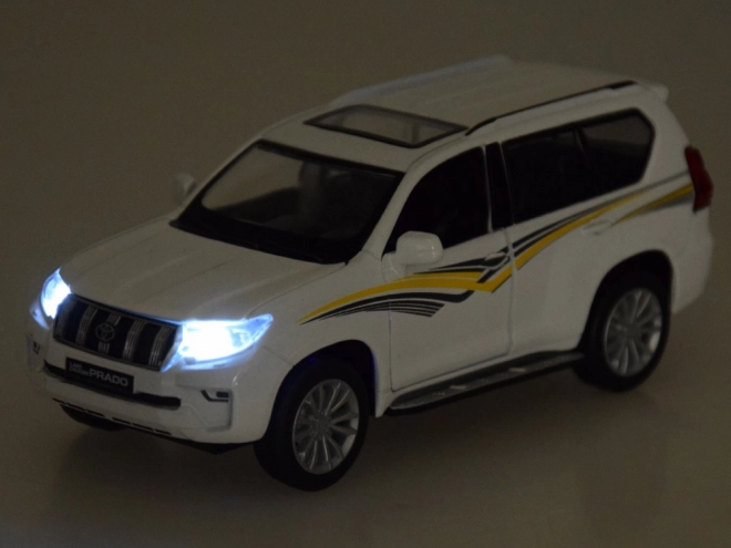 Kovový model Toyota Land Cruiser Prado s efekty