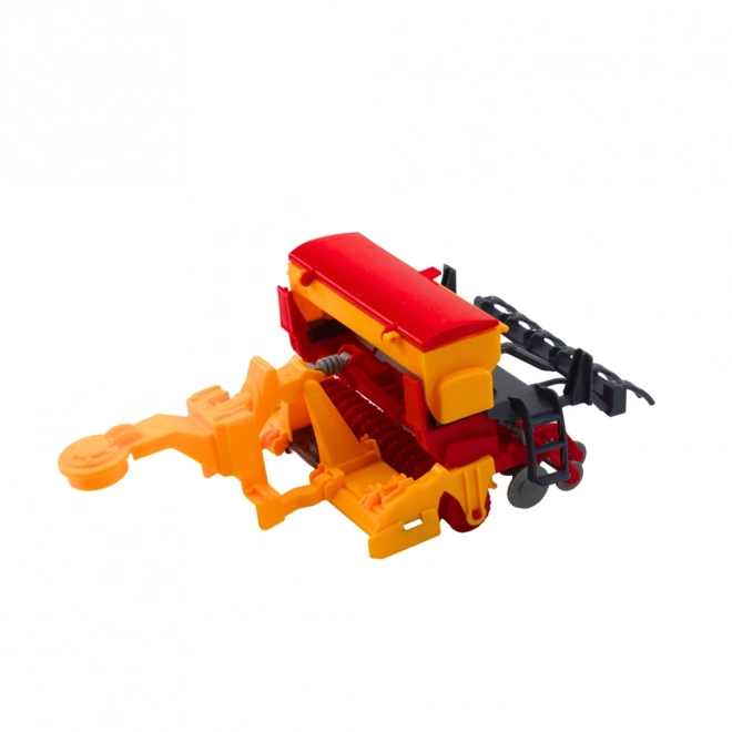 Dětský zemědělský traktor se secím strojem