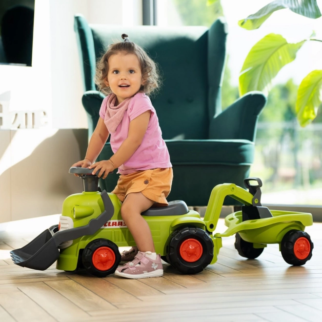 Jezdicí traktor Claas s přívěsem, nakladačem a lžící