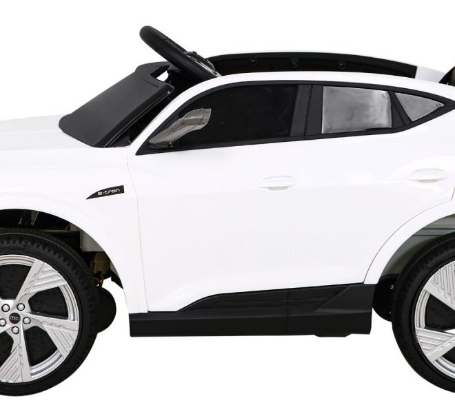 Audi E-Tron Sportback pro děti Bílá + Pilot + pohon 4x4 + pomalý start + rádio MP3 + LED