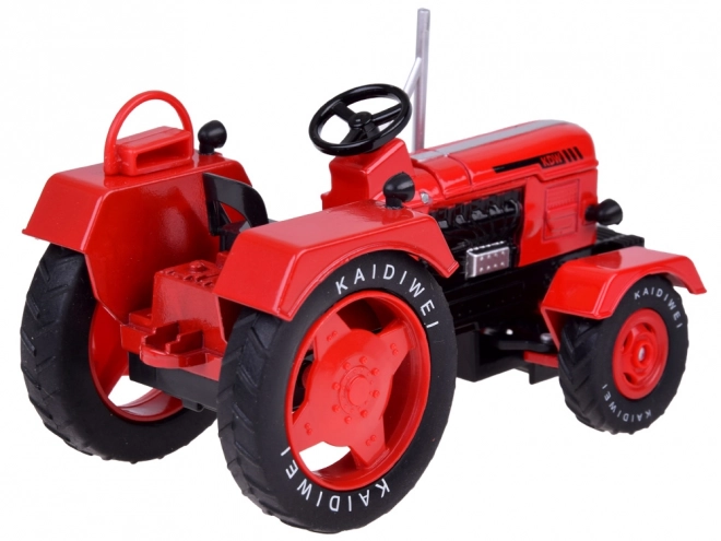 Červený kovový traktor s gumovými kolečky 1:18