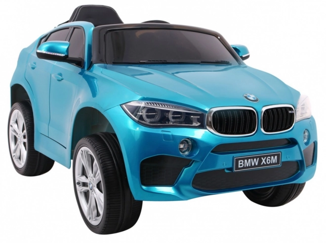 BMW X6M Elektrické dětské auto Modrá barva + dálkové ovládání + EVA + pomalý start + audio + LED dioda