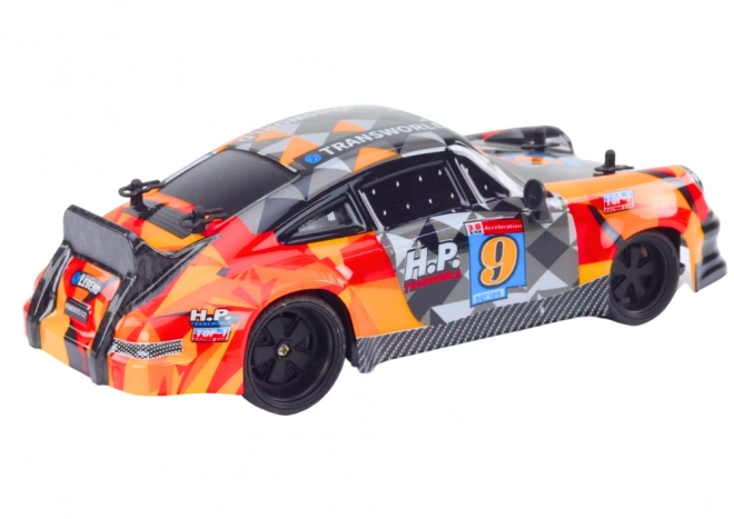 RC auto na dálkové ovládání 1:18 gumová driftovací kola oranžová