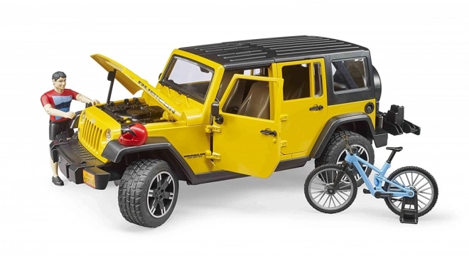 Bruder Jeep Wrangler Rubicon s cyklistou a kolem