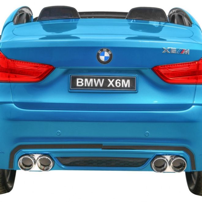 BMW X6M XXL pro 2 děti Modrá barva + Pilot + Eco kůže + Bezpečnostní pásy + Pomalý start + MP3 + LED