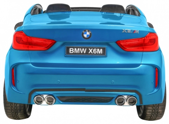 BMW X6M XXL pro 2 děti Modrá barva + Pilot + Eco kůže + Bezpečnostní pásy + Pomalý start + MP3 + LED