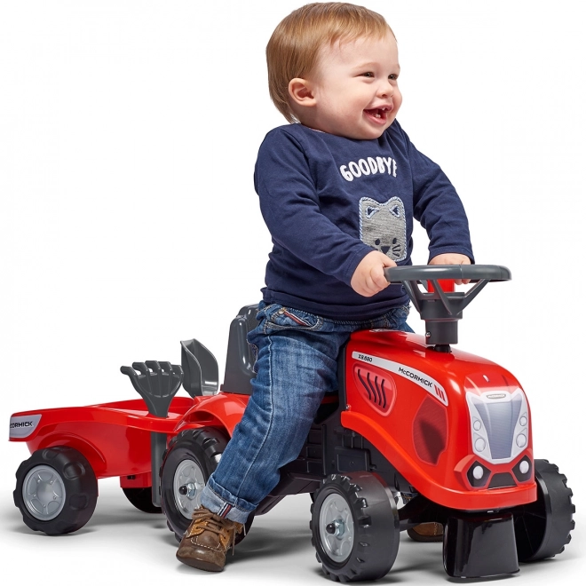 Dětský traktor Baby Mac Cormick červený s přívěsem